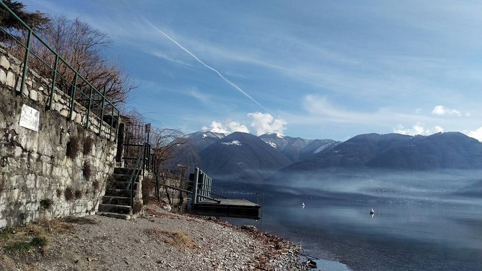 Lake Lugano in February with mist over the water